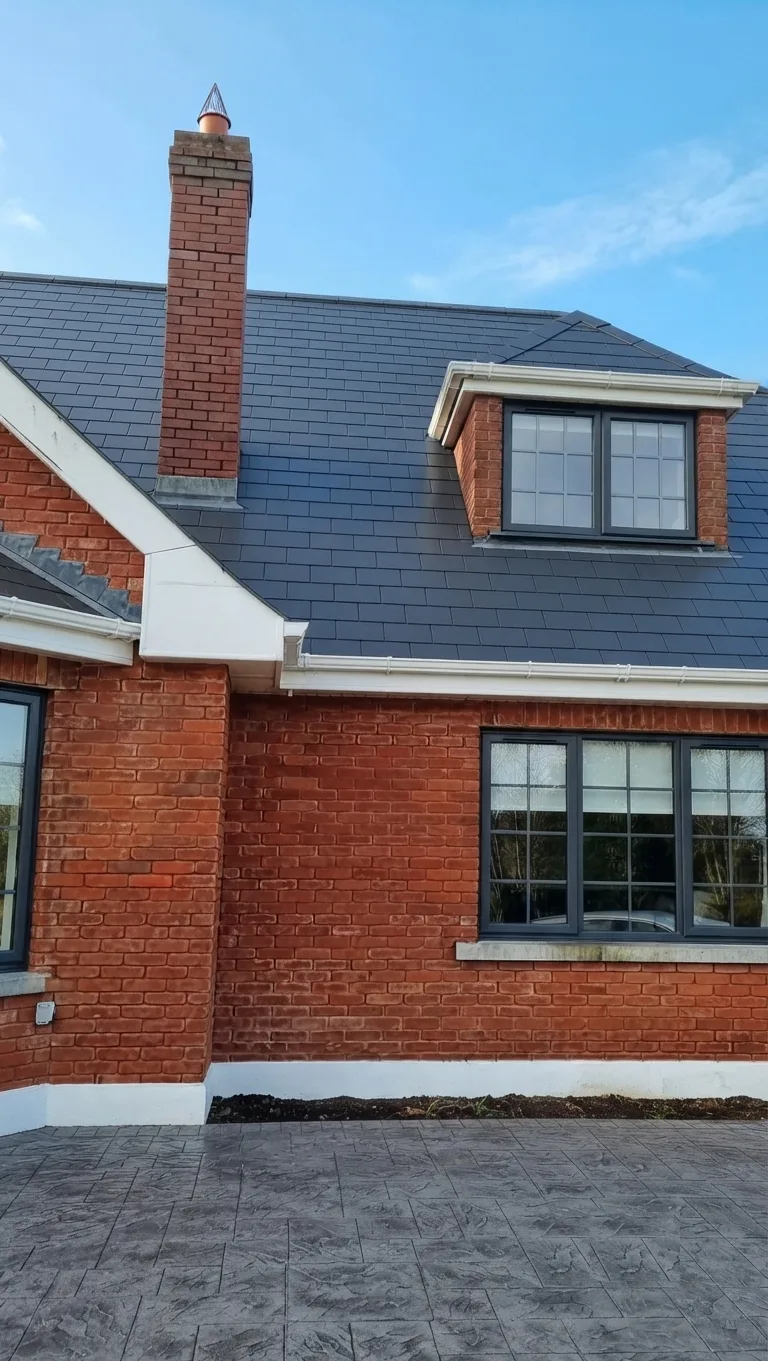 Rooftop renovation work in progress over an Irish suburban neighbourhood