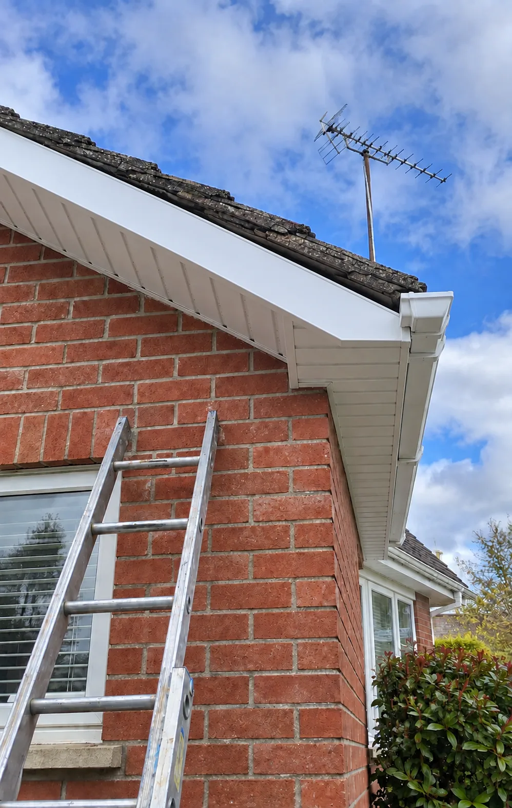 New bargeboard and fascia installation on the gable end of an Irish house with replaced guttering